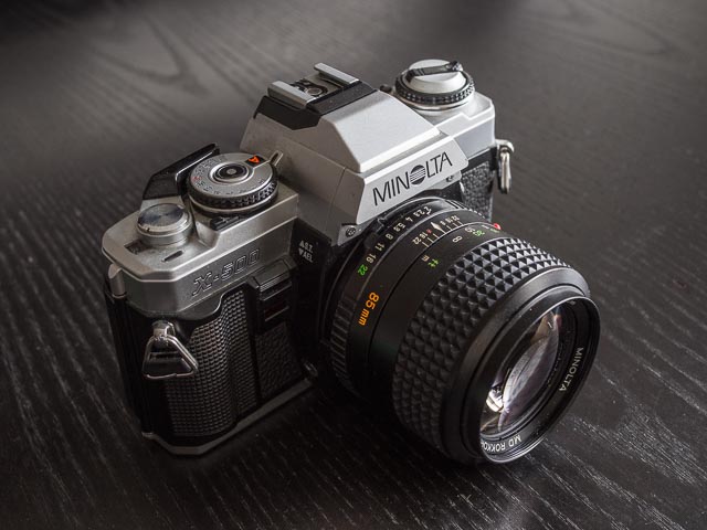Minolta MD Rokkor 85mm f/2.0 lens mounted on a Minolta X-500 camera