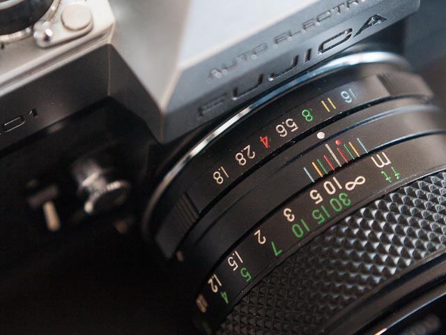 EBC Fujinon 55mm f/1.8 lens aperture ring detail