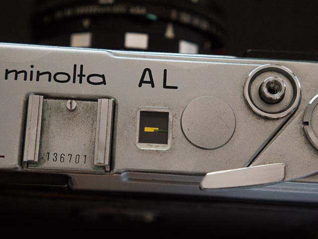 Strange compartment on Minolta AL between the exposure counter and shutter button.