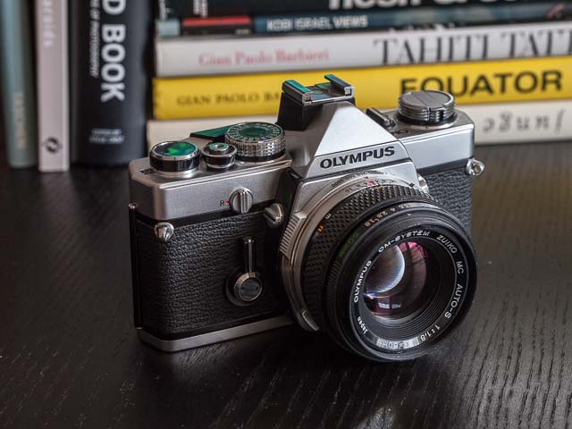 Olympus OM-1 camera fitted with the Olympus OM Zuiko MC Auto-S 50mm f/1.8 lens