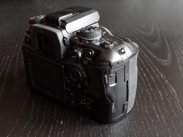Konica Minolta Alpha-7 video out port in the memory card door.