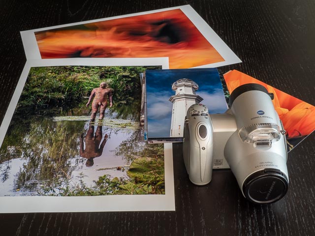 Konica Minolta DiMAGE Z10 with prints